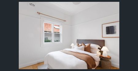 Sun-Drenched Coastal Semi with Charming Period Features - Photo 4