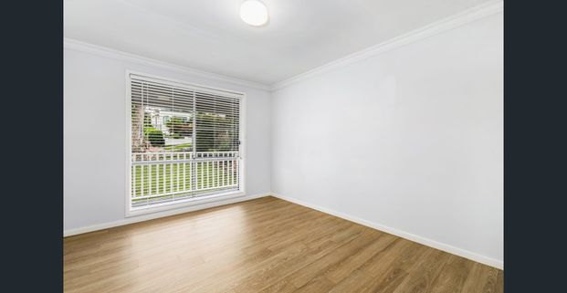 A GREAT FAMILY HOME - Lawn Maintenance Included - Photo 1