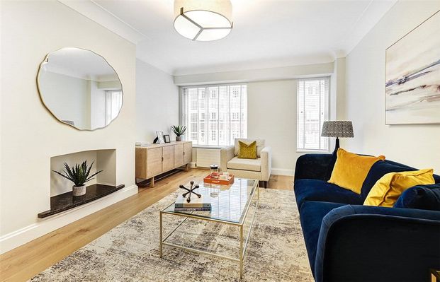 A beautifully presented two bedroom flat situated on the first floor of this well run portered block on Kensington High Street moments away from the green spaces of Holland Park too. EPC rating: D - Photo 1
