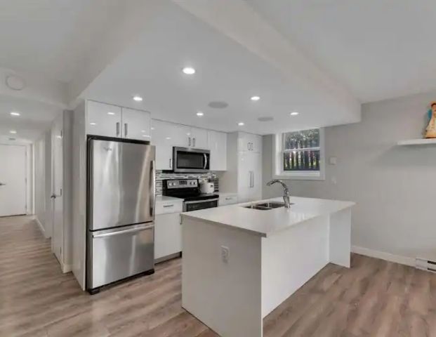 Stylish 2-Bedroom Condo in Trendy Marda Loop – Quiet, Bright & Modern | 101 - 2035 34 Avenue Southwest, Calgary - Photo 1