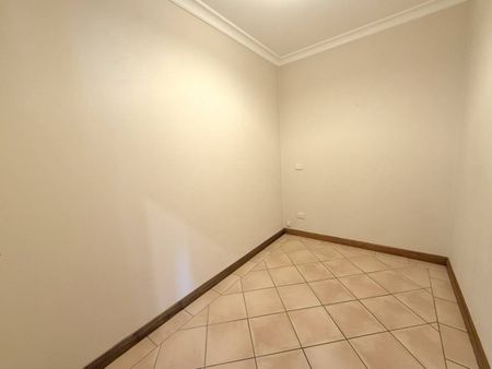 Spacious Family Home with Breathtaking Bushland Views and Flexible Living - Photo 4