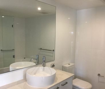 Modern Lake side Living in the Emporio Complex - Photo 3