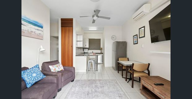 Furnished 1-Bedroom Apartment with Pool & Beachside Convenience - Photo 1