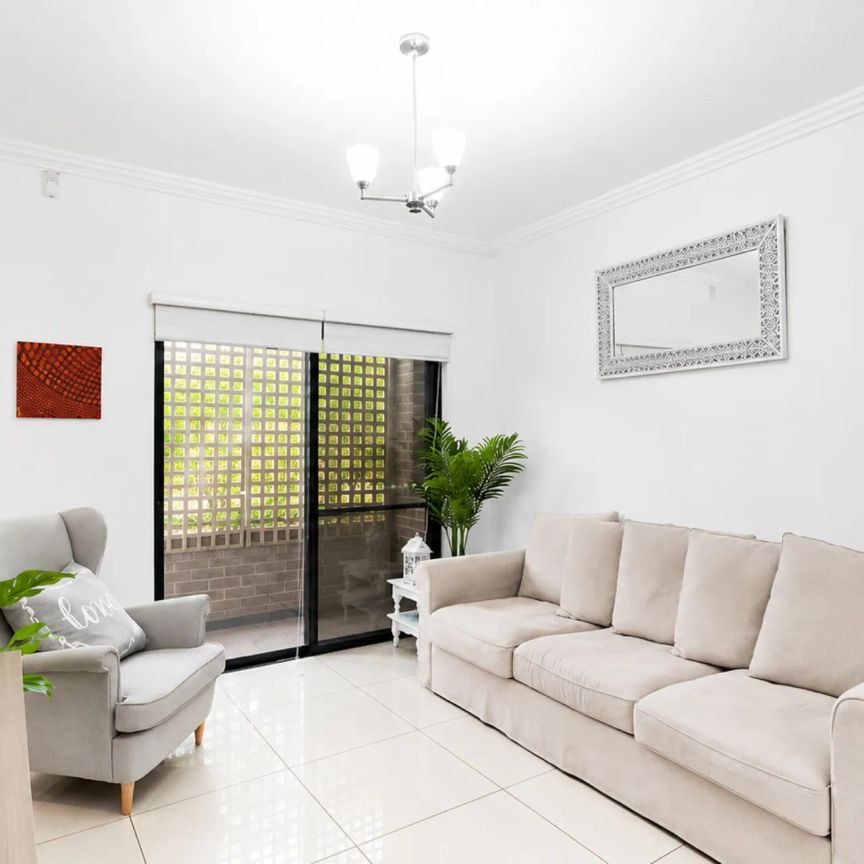 Convenient Townhouse in Prime Location - Photo 1