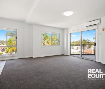 Affordable 2 Bedroom Apartment - Across from Train Station! - Photo 1