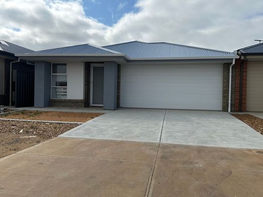 Brand New 3 Bedroom, 2 Bathroom Home in Prime Location - Photo 1