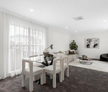“Modern Family Living in Strathmore Heights” - Photo 1