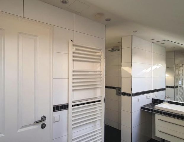 All-Inclusive 2,5-Zimmer-Dachgeschosswohnung mit Sonnenterrasse - Foto 1