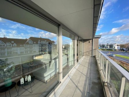 Verzorgd instapklaar appartement met 2 slaapkamers, 2 terrassen en een ondergrondse autostaanplaats - Photo 4