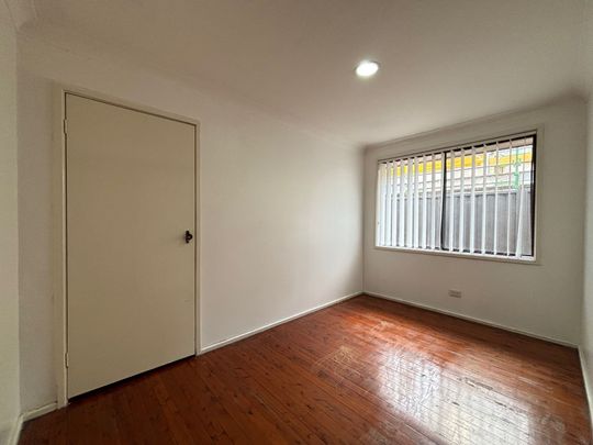 Comfortable Living in a Well-Maintained Home - Photo 1