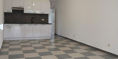 Appartement te huur in Ghlin voor € 595 met 1 slaapkamer - Photo 5