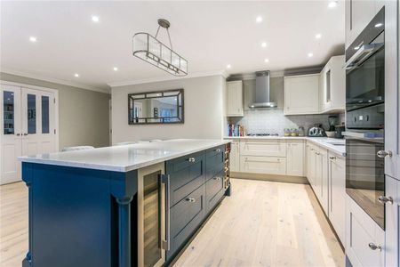 An extended four bedroom detached home finished to an exceptionally high standard and offered furnished - Photo 3