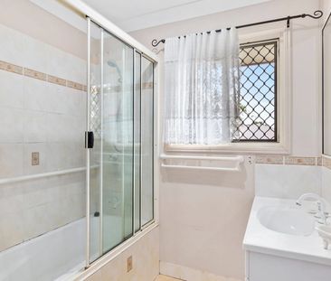 Comfortable Low-Set Brick Home - Photo 2