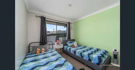 Charming Three-Bedroom Home with Double Lock-Up Garage - Photo 2