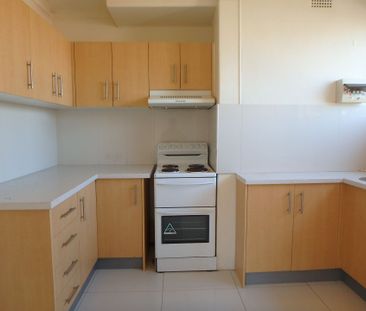 Neat 1st Floor Unit with Ideal Location - Photo 2