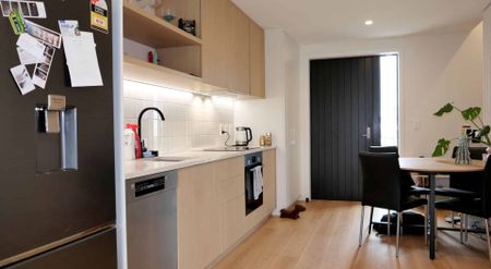 Stylish and Sun-Filled Two-Bedroom Townhouse - Photo 2