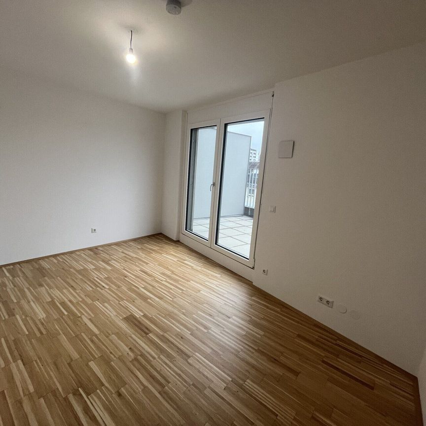 2-Zimmer-Dachgeschoß-Wohnung mit großer Terrasse und Klimaanlage in Niedrigenergiehaus in 1110 Wien zu mieten - Photo 1