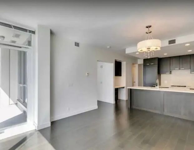 Beautifully Maintained One-Bedroom Unit at Waterfront | 1818 - 222 Riverfront Avenue Southwest, Calgary - Photo 1