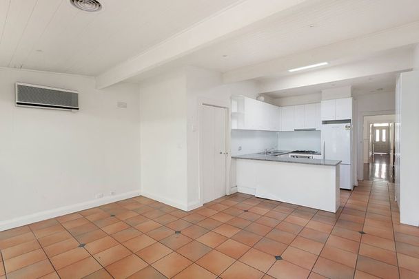 ADORABLE FREESTANDING 2 BEDROOM HOUSE IN A PREMIUM LOCATION - Photo 1