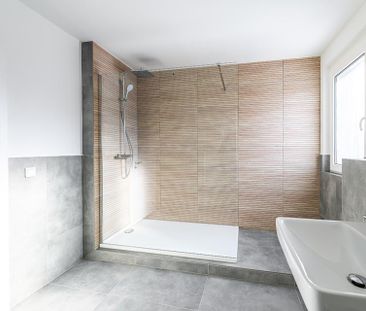 Frisch sanierte 2-Zimmer-Wohnung im Erstbezug mit Terrasse & Stellp... - Photo 5