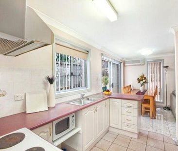 Three Bedroom Well Maintained Townhouse - Photo 4