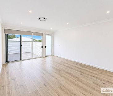 Near New, Architecturally Designed Villa with Spacious Yard - Photo 1