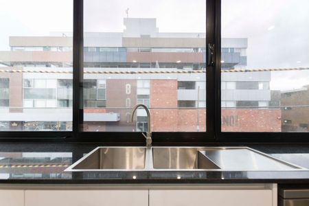 Luxurious Tri-Level Townhome in the Heart of Brunswick - Photo 3
