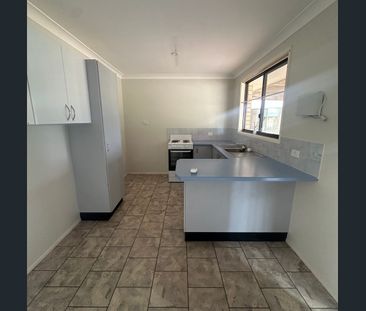 Charming Family Home with Spacious Outdoor Living - Photo 4