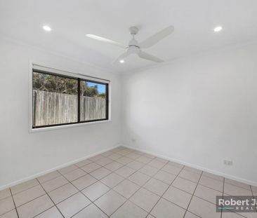 Bright and Breezy 3 Bed Home with Fruit - Photo 6