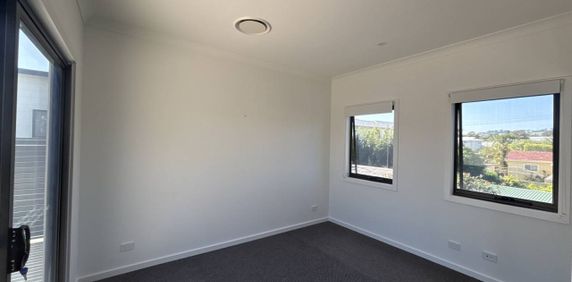 Stylish & Spacious Townhouse Living in a Prime Location - Photo 2