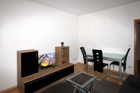 Traumhafte und charmant möblierte Wohnung in der Innenstadt! - Photo 2