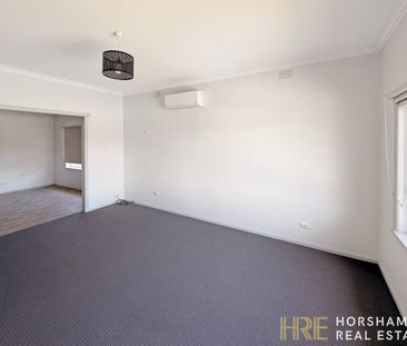 Modern Three-Bedroom Home Close to the CBD - Photo 1