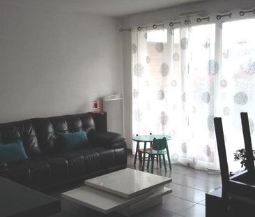 Location Appartement 3 pièces 64m² BOUGUENAIS 44340 - Photo 1
