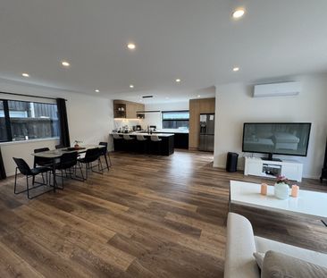 Nestled in the heart of Queenwood, this modern three-bedroom, two-b... - Photo 1