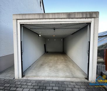 Familienfreundliche 3-Zimmer-Wohnung mit Garage und Gartenmitbenutzung - Photo 1