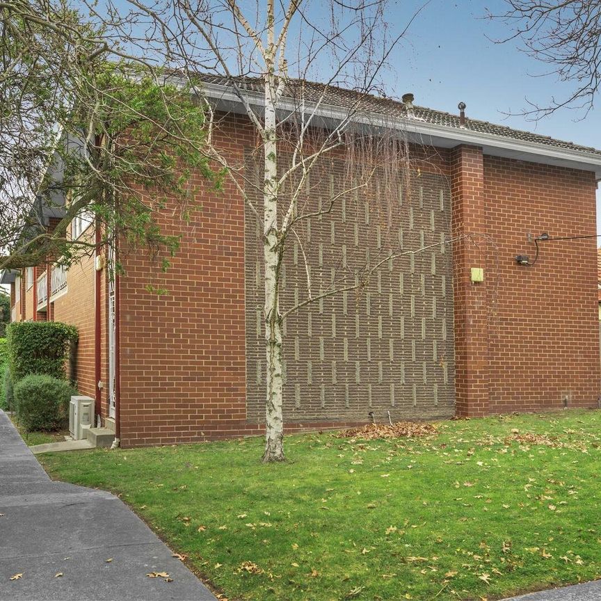TWO BEDROOM BEAUTY IN SOUGHT AFTER LOCATION - Photo 1
