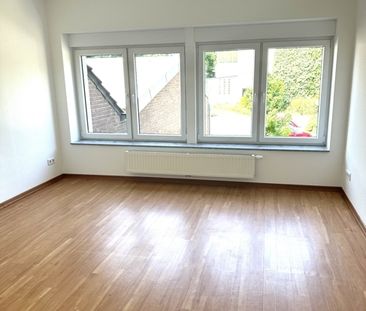 Moderne 4 Zimmer Maisonette-Wohnung mit Dachloggia und Stellplatz in Moers-Vennikel/Grenze Traar - Photo 1