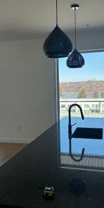 magnifique 5 1/2 neuf vue sur le fleuve - Photo 4