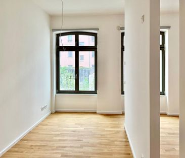 Erstbezug: charmante Maisonette mit Terrasse in historischer Remise - Foto 1