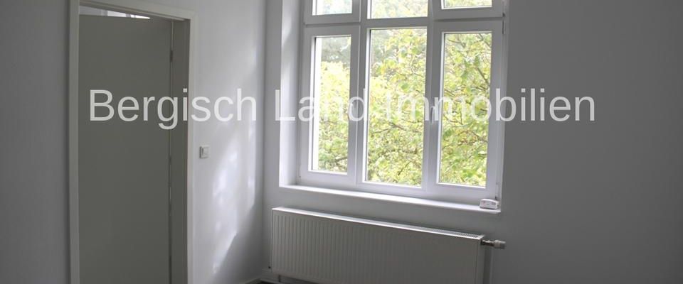 Charmante Hochparterre-Wohnung in zentrumsnaher Lage von Gummersbach! - Photo 1