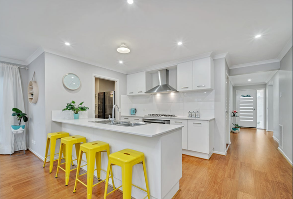 Contemporary Living at Its Best - Beautiful Home with Remarkable Electricity Savings! - Photo 1