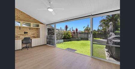 Skyline Views, Solar Savings & Three Brand-New Bathrooms — Your Bundall Haven Awaits - Photo 3