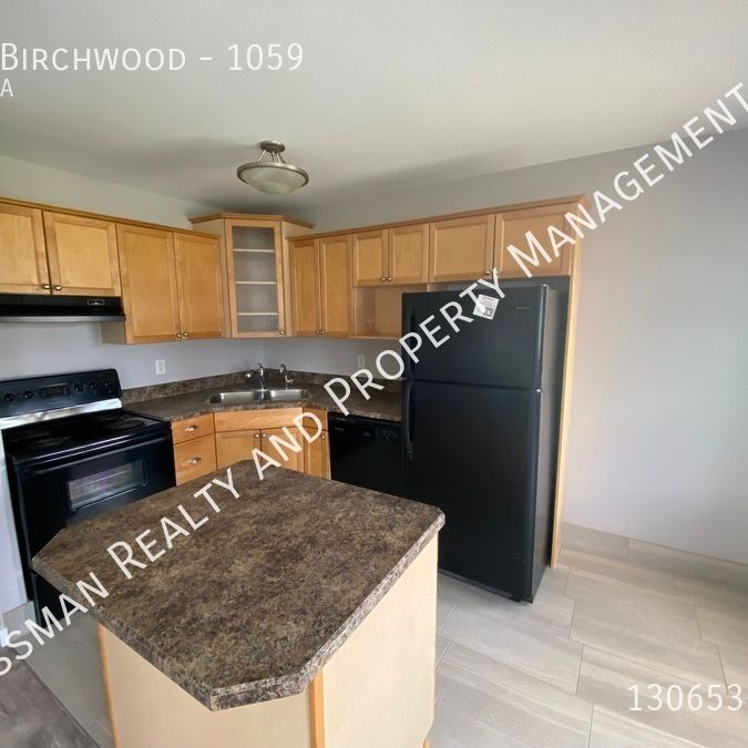 Upper level condo in South Regina - Photo 1