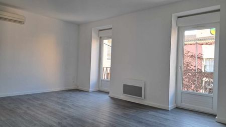 Location - Appartement T3 de 99 m² avec terrasse et balcon - Photo 3