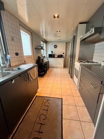 Woning te huur met twee slaapkamers en tuin. - Foto 3