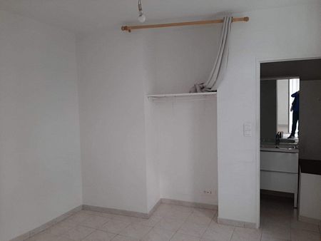 Location - Appartement T1 bis de 26 m² au RDC d'un immeuble de ville avec un cellier privatif - Photo 3