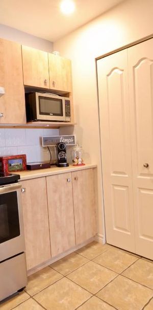 CONDO ENTIÈREMENT MEUBLÉ TOUT INCLUS SECTEUR TRANQUILLE BIEN SITUÉ - Photo 1