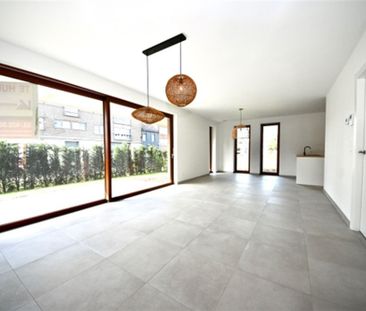 Appartement met 2 slaapkamers, tuin en staanplaats. - Foto 2