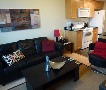 Available NOW, downtown one bedroom plus den condo - Photo 1