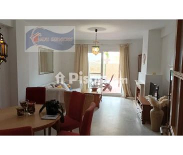 Casa adosada en alquiler en Nuevo Portil - Photo 1